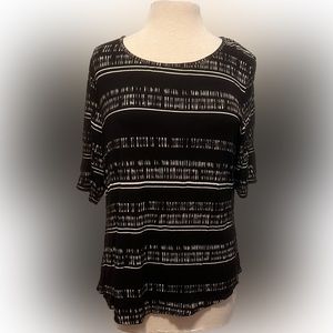 Soft fabric, comfy black and cream striped top. Worn some, still in great shape.